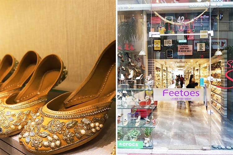 Footwear,Shoe,Shoe store,High heels,Retail,Fashion accessory,Building,Brand,Display window,Boutique