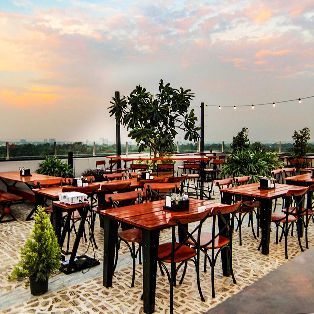 Sky,Restaurant,Table,Tree,Morning,Palm tree,Vacation,Evening,Resort,Building