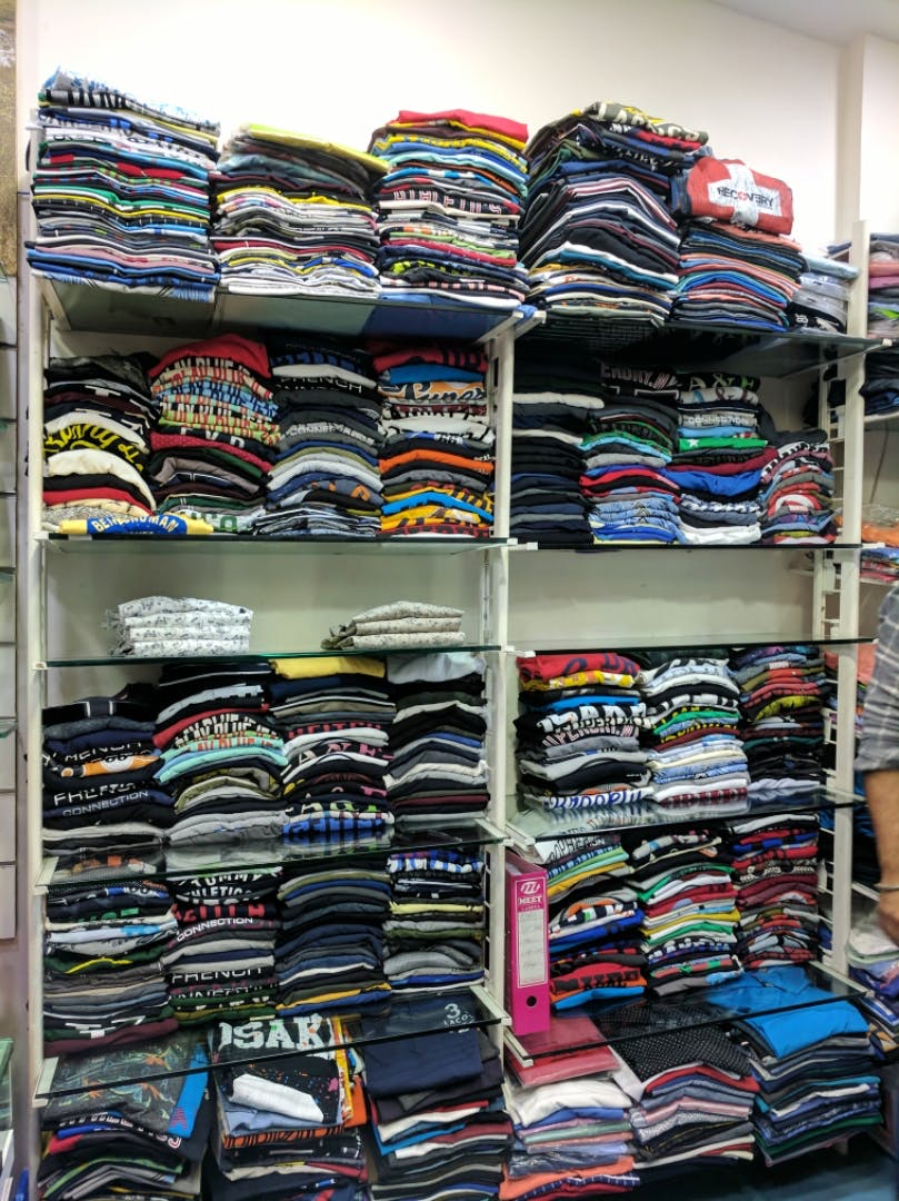 Product,Footwear,Room,Collection,Textile,Outlet store,Retail,T-shirt,Shoe,Building