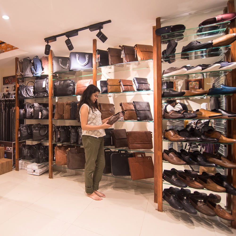 Footwear,Shoe store,Room,Shoe,Building,Retail,Inventory,Collection,Outlet store,Furniture