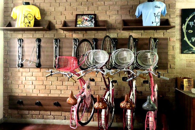 Wall,Shelf,Room,Fashion accessory,Bicycle,Collection,House,Glasses