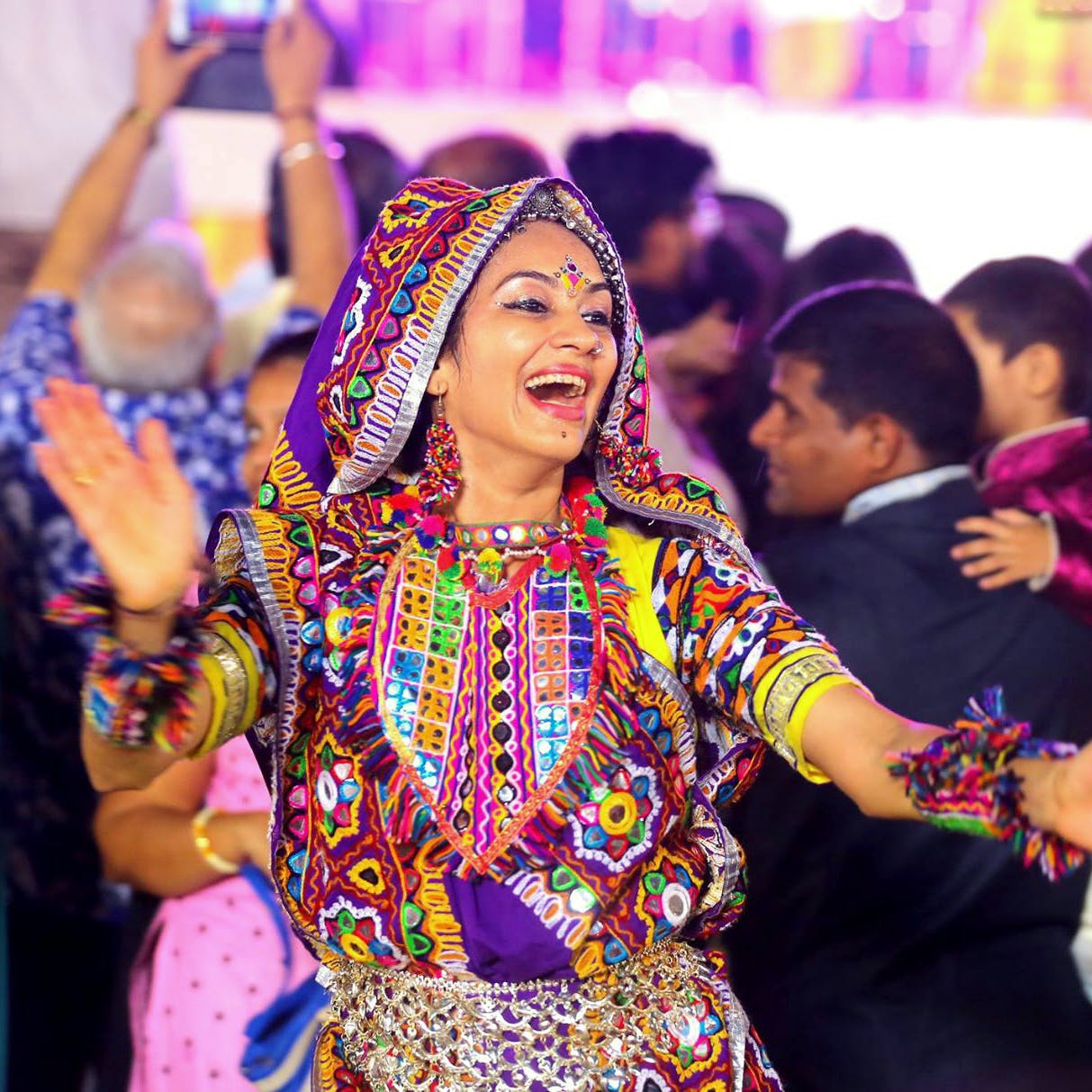 People,Facial expression,Tradition,Event,Purple,Smile,Performance,Folk dance,Dancer,Fun