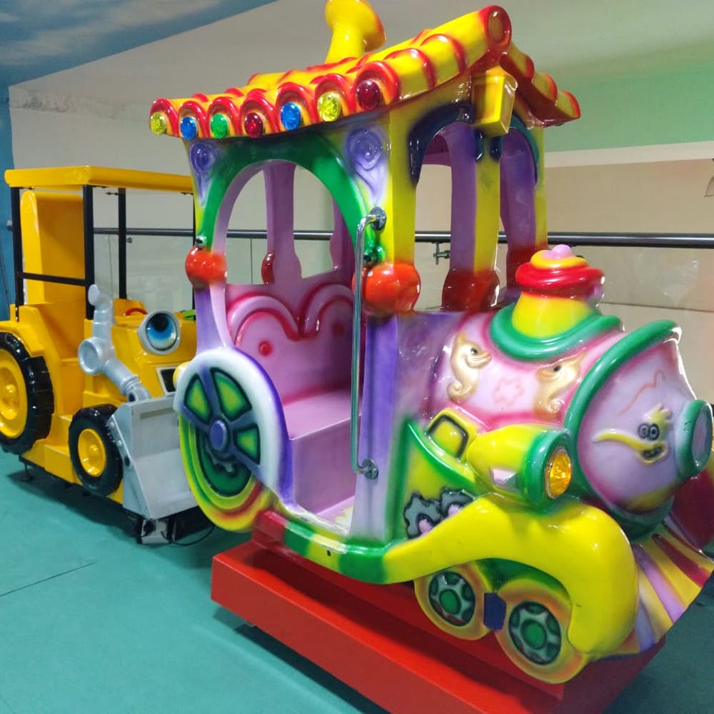 Toy,Playset,Product,Fun,Mode of transport,Amusement ride,Public space,Recreation,Vehicle,Amusement park