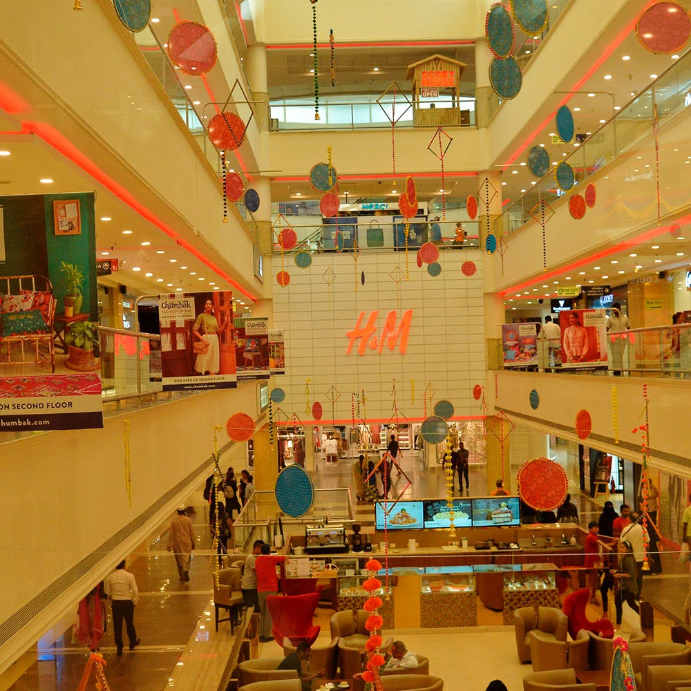 Shopping mall,Building,Retail,Outlet store,Interior design,Supermarket,Business,Room,Shopping,Food court