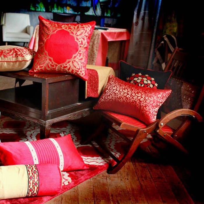 Red,Furniture,Room,Cushion,Interior design,Living room,Pink,Chair,Pillow,Textile