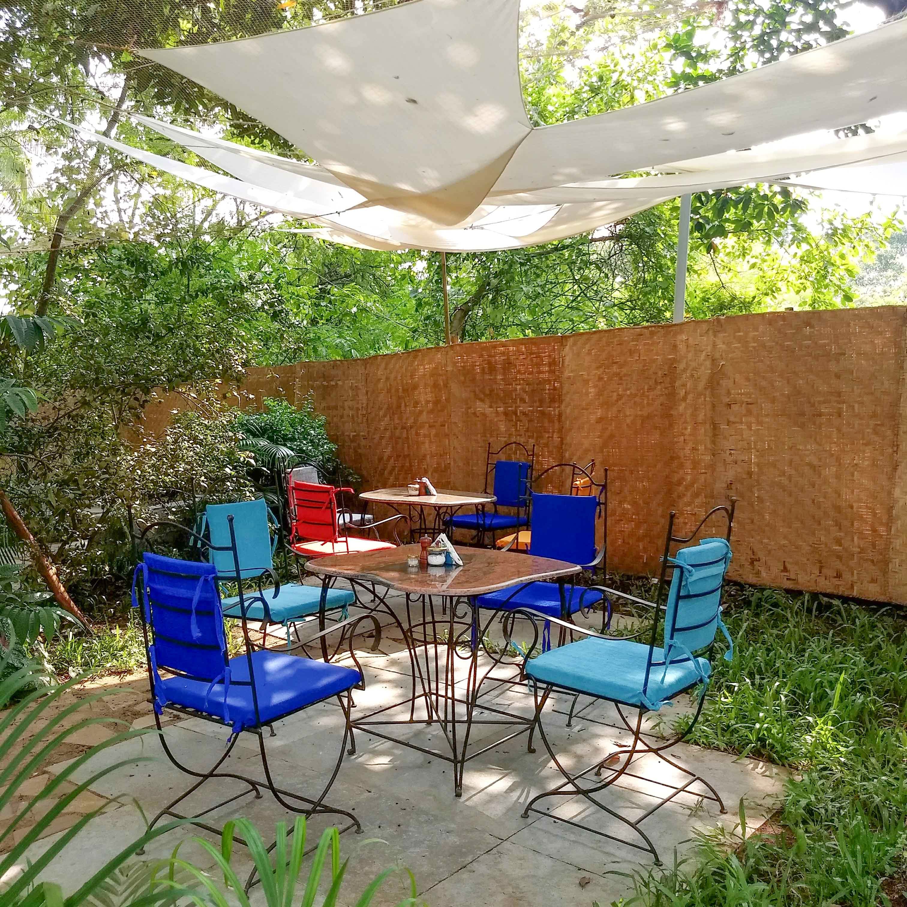 Patio,Backyard,Yard,Property,Shade,Garden,Table,Furniture,Real estate,House