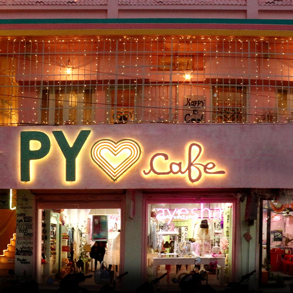 Building,Lighting,Facade,Font,Night,Architecture,Neon,Restaurant,Mixed-use,Outlet store