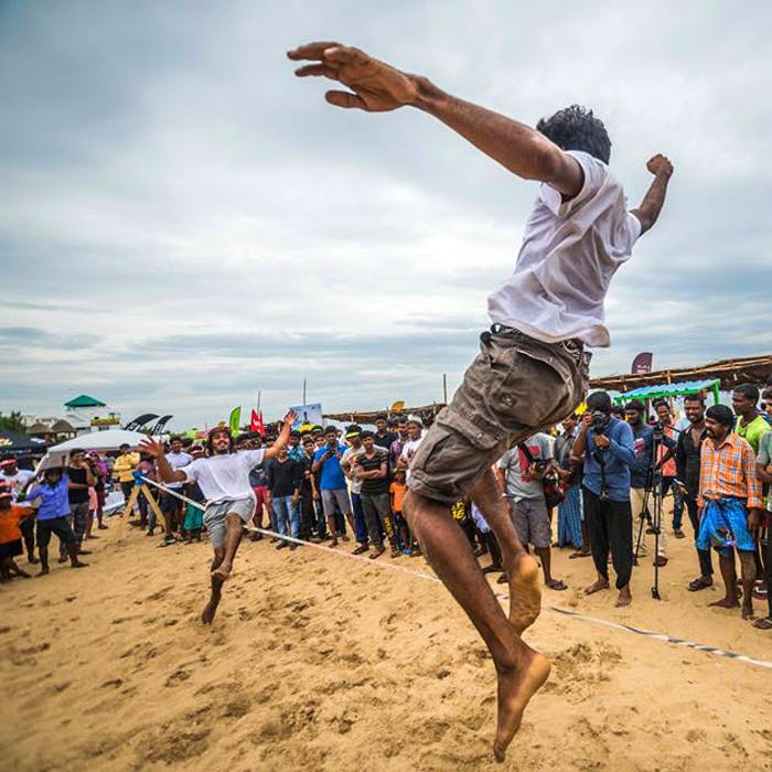 Fun,Jumping,Sand,Flip (acrobatic),Beach,Dance,Sports,Crowd,Happy,Team sport