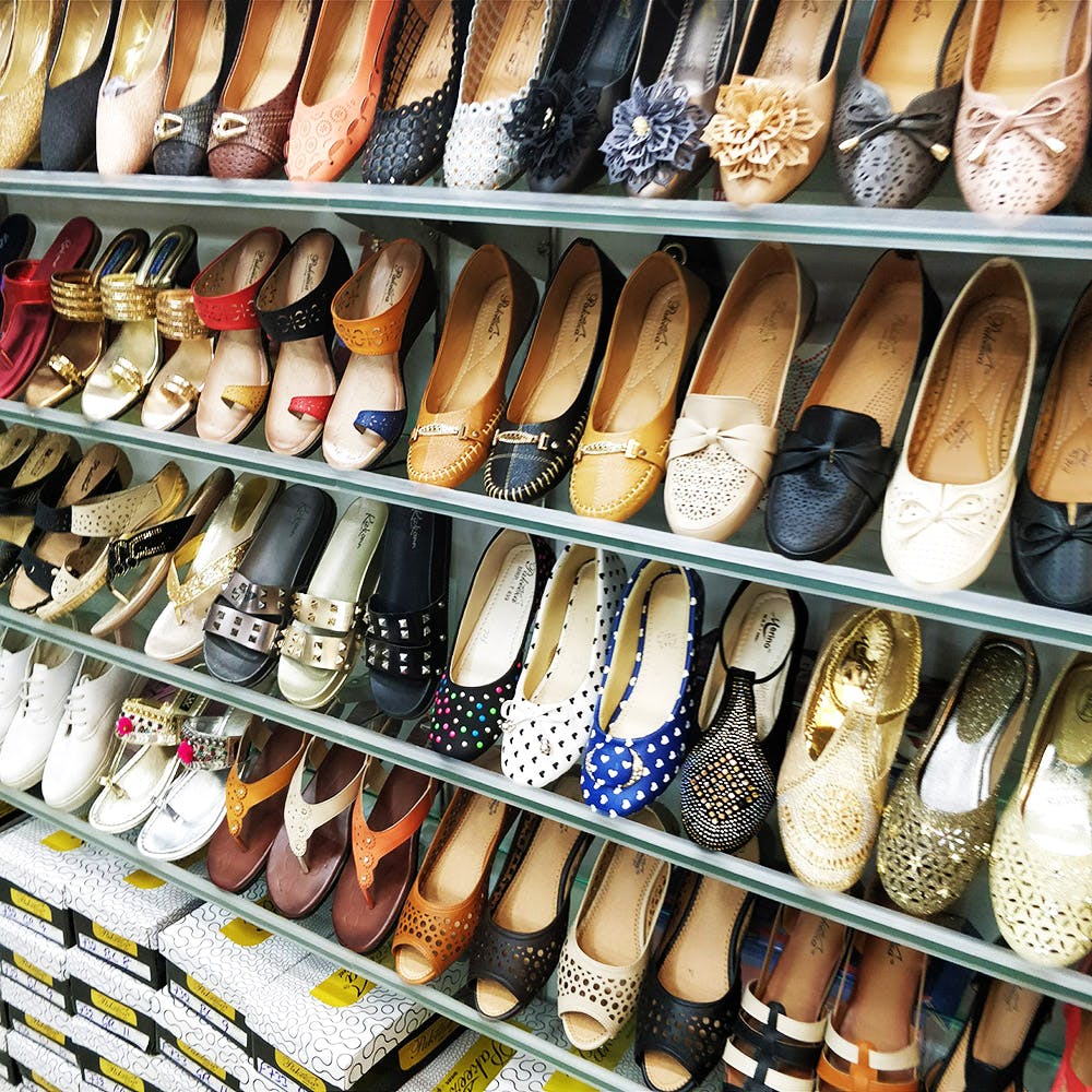 Footwear,Shoe,Shoe store,Dress shoe,Collection,Espadrille,Selling
