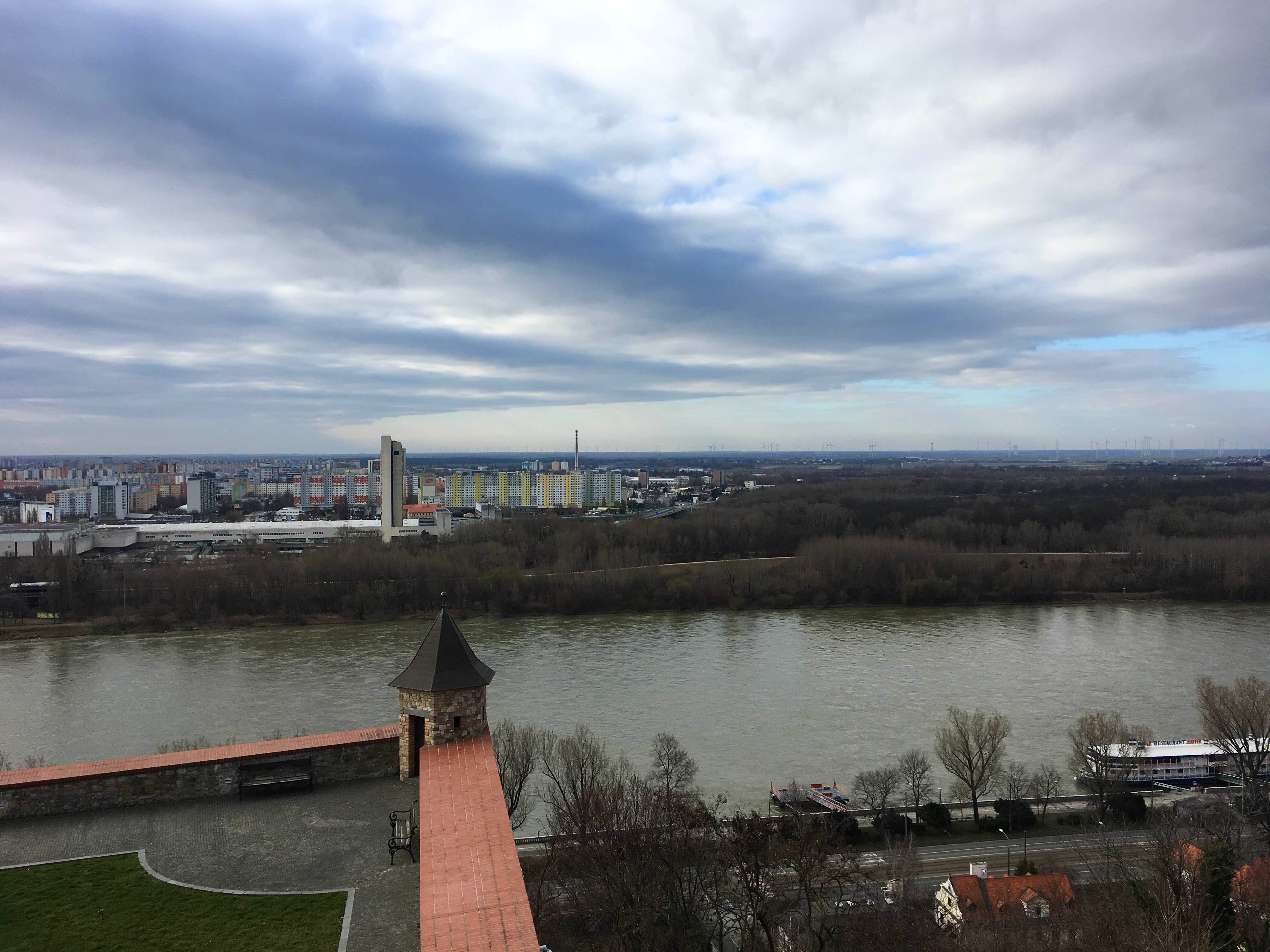 Sky,Water,Cloud,River,Bridge,Water resources,Waterway,Reflection,City,Architecture