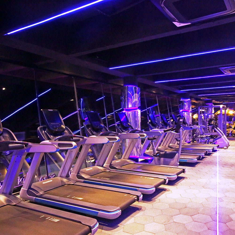 Purple,Treadmill,Room,Exercise machine,Exercise equipment,Sport venue,Architecture,Night,Leisure,Sports equipment