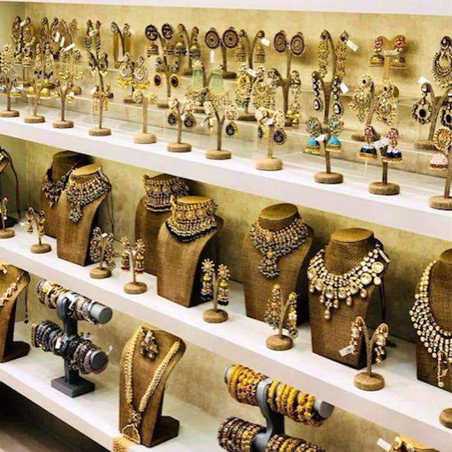 Collection,Room,Interior design,Fashion accessory,Ceramic,Ancient history,Metal