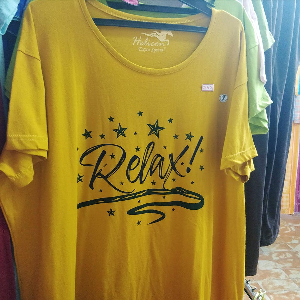 Clothing,T-shirt,Yellow,Active shirt,Sleeve,Top,Sportswear,Font,Outerwear,Electric blue