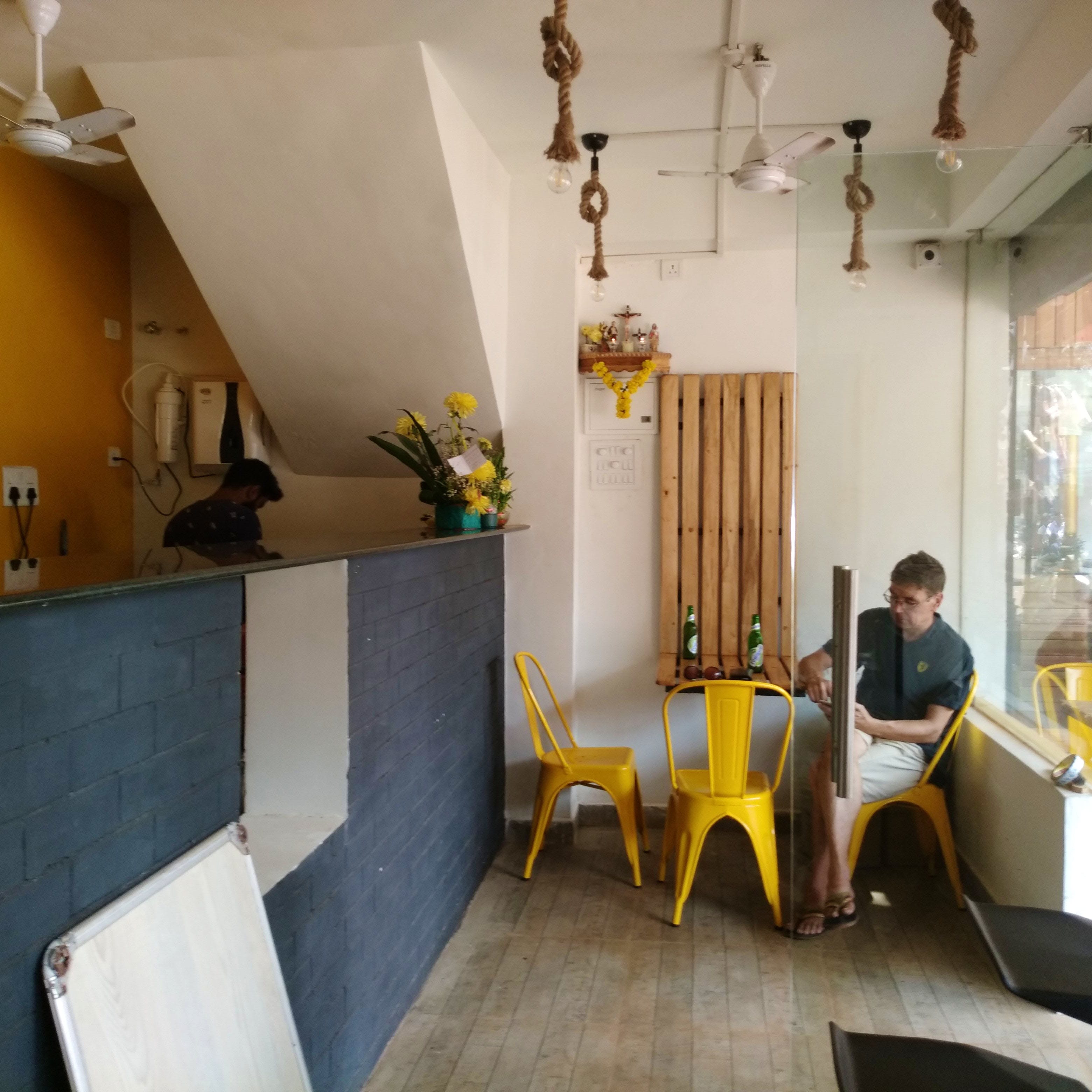 Room,Yellow,Interior design,Ceiling,Property,Dining room,Building,Furniture,Table,Architecture