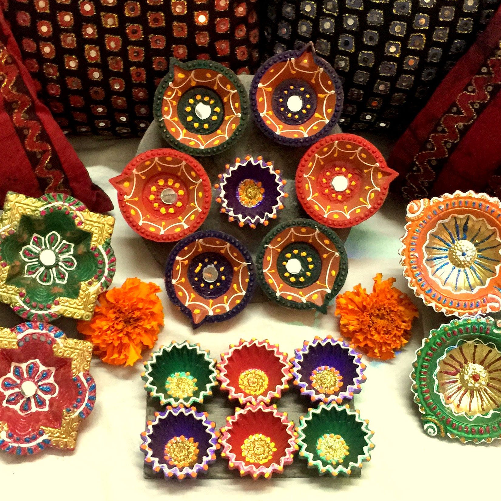 Orange,Crochet,Textile,Fashion accessory,Diwali,Art