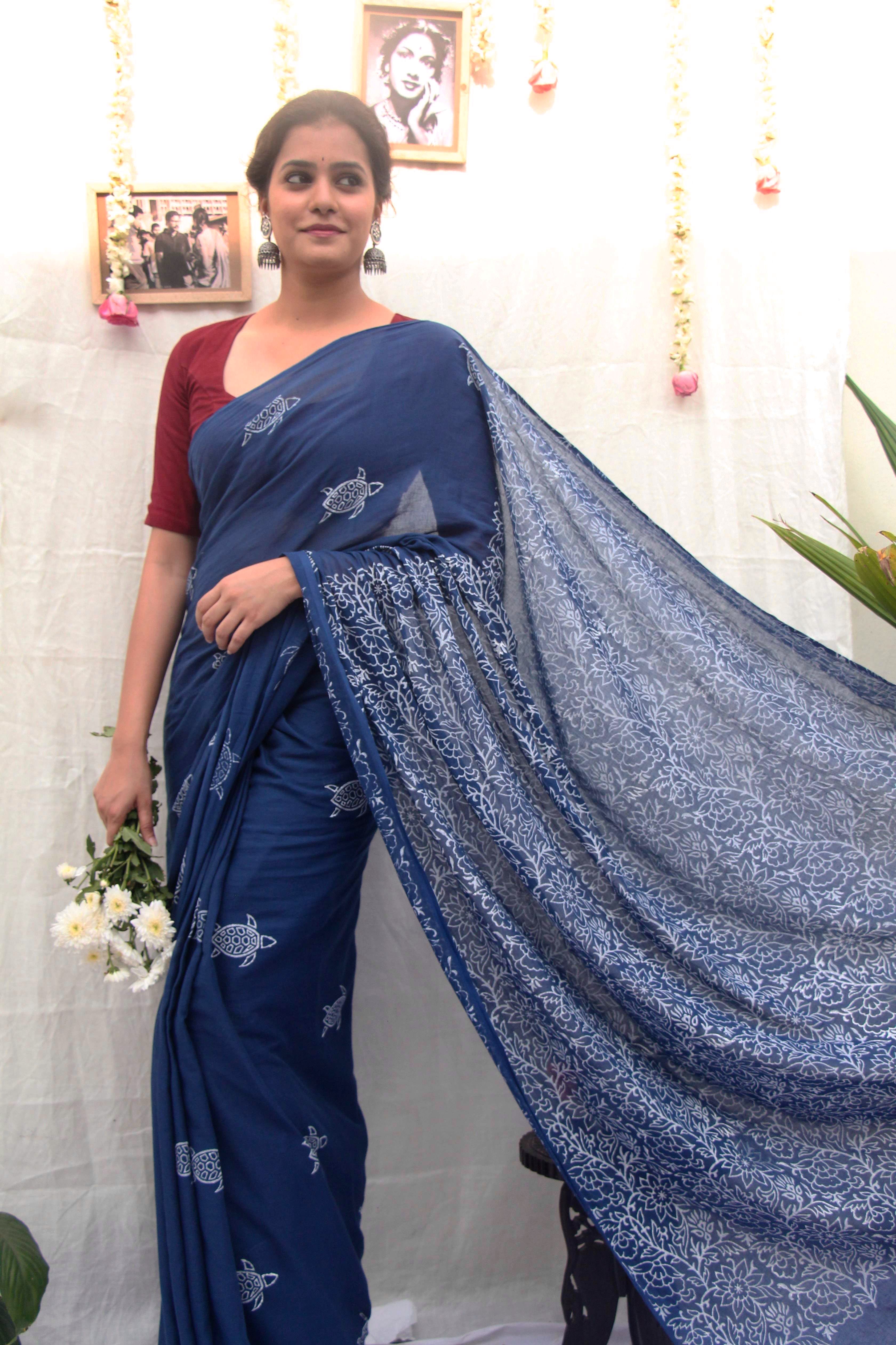 Clothing,Sari,White,Blue,Shoulder,Formal wear,Dress,Fashion,Joint,Textile