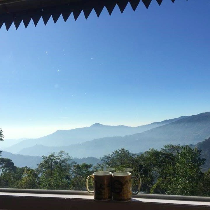 Sky,Mountain,Mountainous landforms,Cloud,Morning,Wilderness,Tree,Snapshot,Sunlight,Vacation