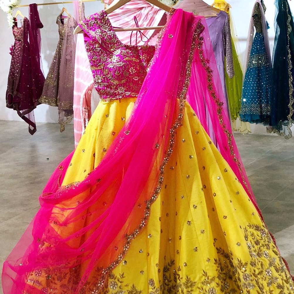 Clothing,Pink,Yellow,Magenta,Dress,Sari,Formal wear,Maroon,Textile,Fashion design