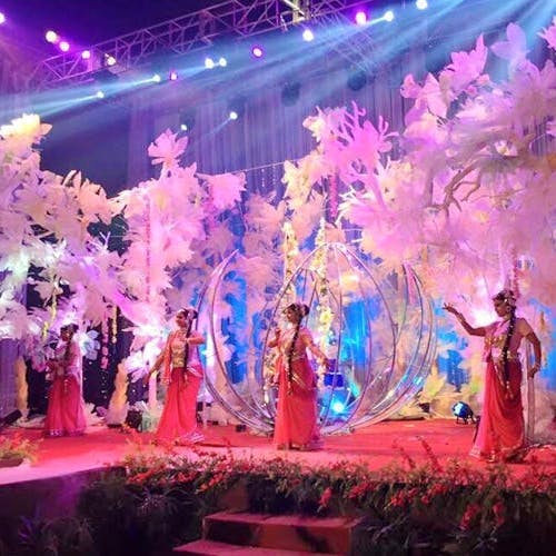 Stage,Performance,Theatrical scenery,Pink,Performance art,Purple,Event,Lighting,Dancer,Decoration