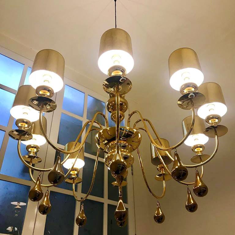 Chandelier,Light fixture,Lighting,Ceiling,Ceiling fixture,Lighting accessory,Light,Incandescent light bulb,Lamp,Light bulb
