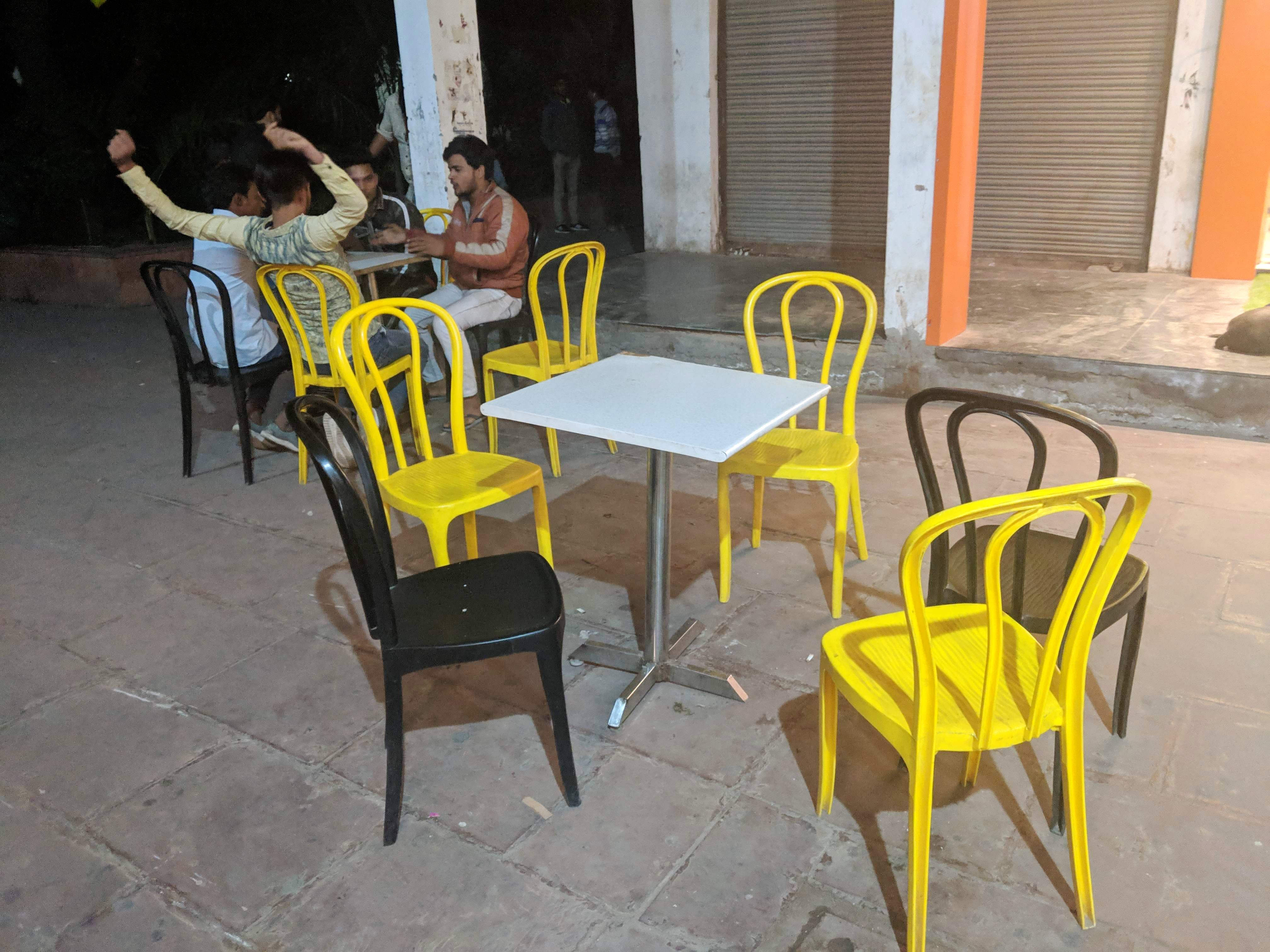Furniture,Chair,Table,Yellow,Outdoor table,Room,Outdoor furniture