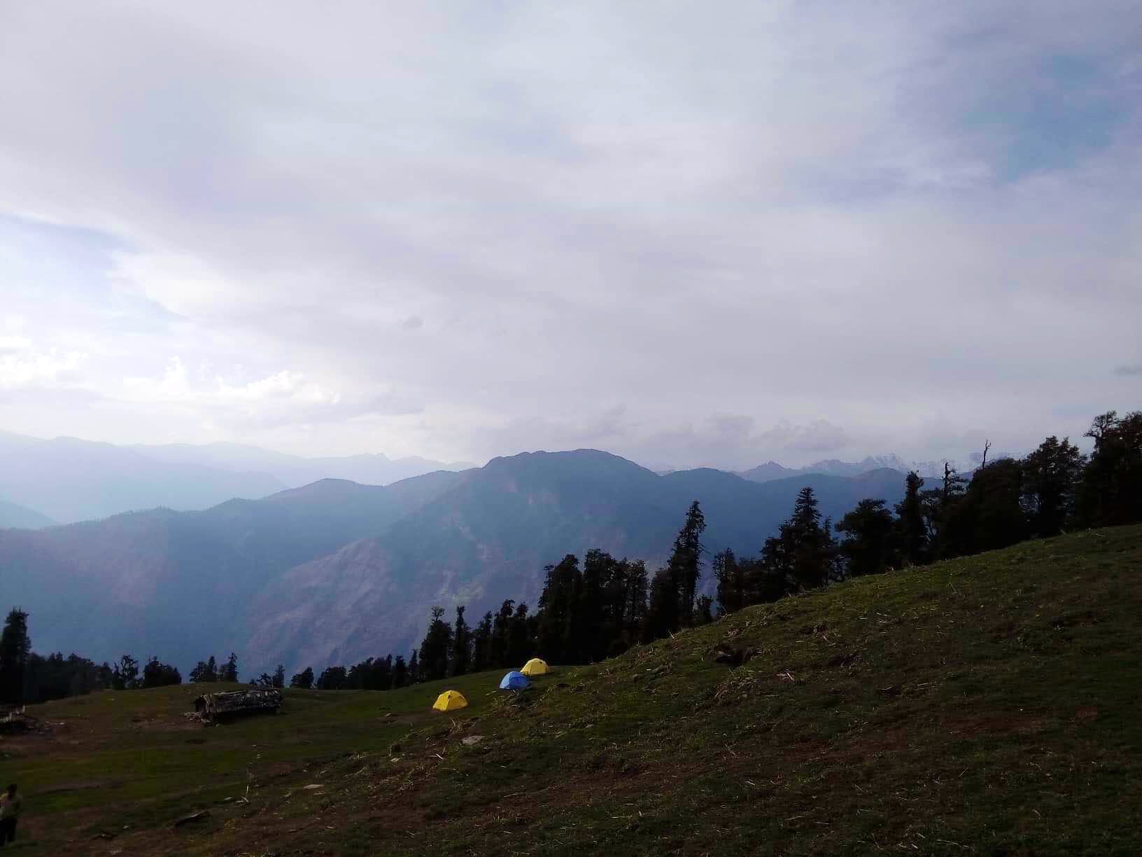 Mountainous landforms,Highland,Sky,Mountain,Hill station,Cloud,Hill,Atmospheric phenomenon,Mountain range,Wilderness