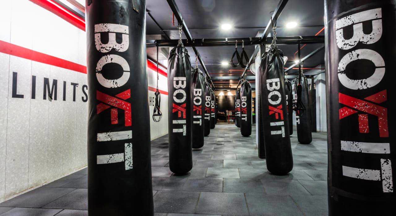 Punching bag,Room,Tire,Automotive wheel system,Advertising,Sport venue,Physical fitness,Wheel,Sports equipment,Art