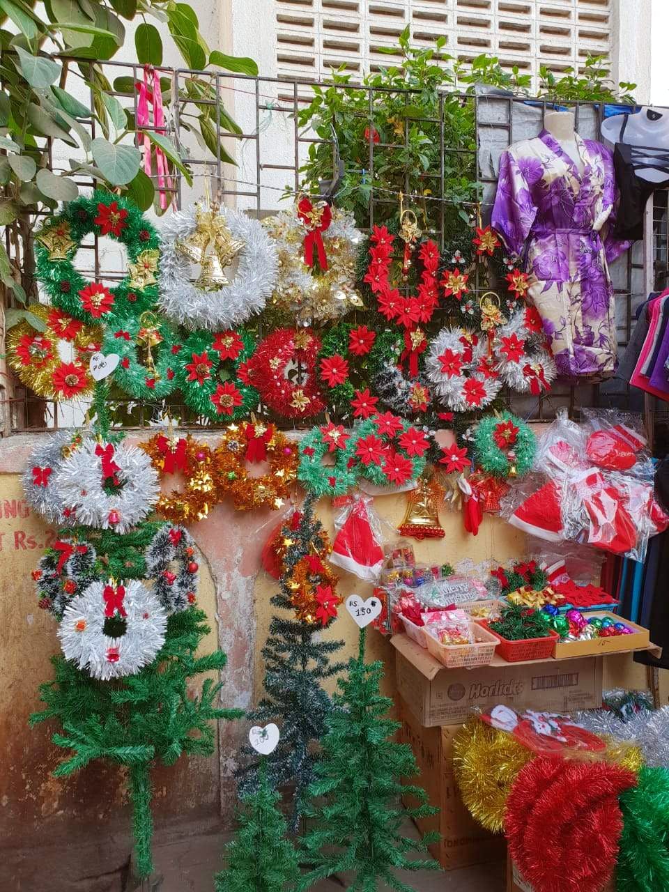 Floristry,Cut flowers,Christmas decoration,Christmas ornament,Flower,Plant,Floral design,Christmas,Artificial flower,Textile