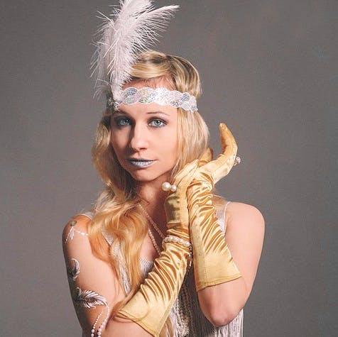 Hair,Feather,Lady,Blond,Hairstyle,Headpiece,Beauty,Glove,Fashion,Arm