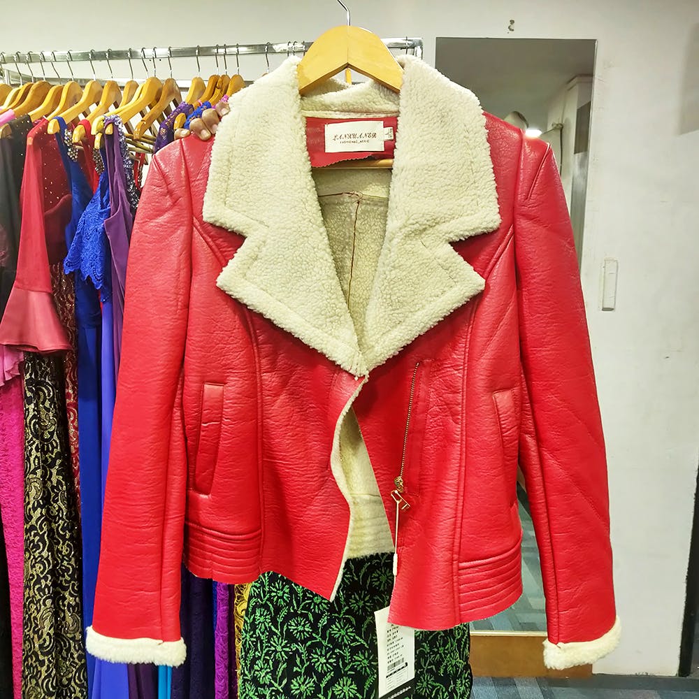Clothing,Jacket,Outerwear,Clothes hanger,Leather,Red,Leather jacket,Pink,Textile,Fashion