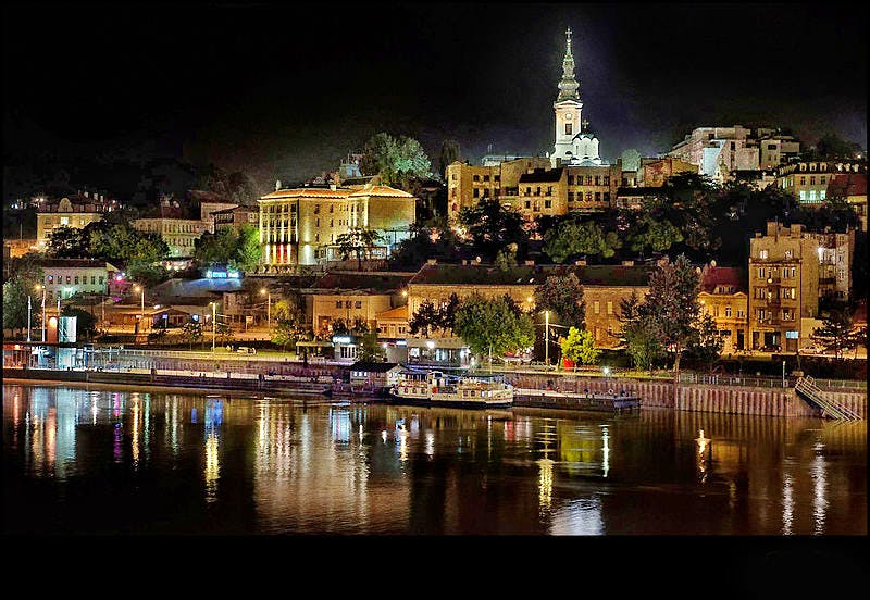 Night,Reflection,Water,City,Sky,Cityscape,Town,Urban area,Waterway,Landmark