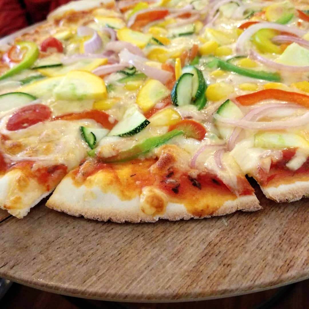 Dish,Food,Cuisine,Pizza,Pizza cheese,Ingredient,Flatbread,Tarte flambée,California-style pizza,Italian food