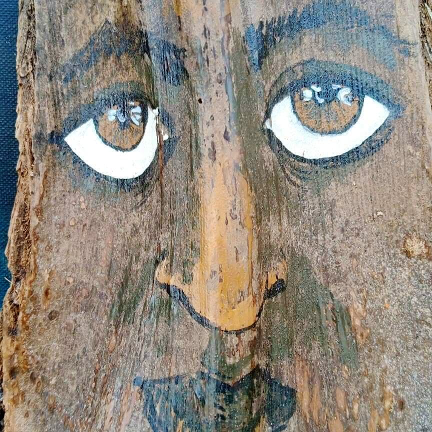 Face,Eye,Wood,Art,Nose,Head,Tree,Organ,Cheek,Visual arts