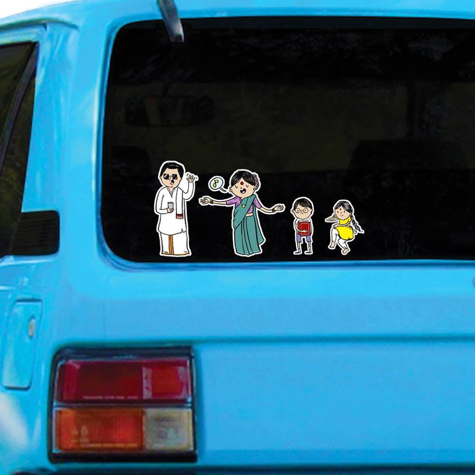 Vehicle,Car,Mode of transport,Sticker,Family car,Automotive exterior,Bumper sticker,City car