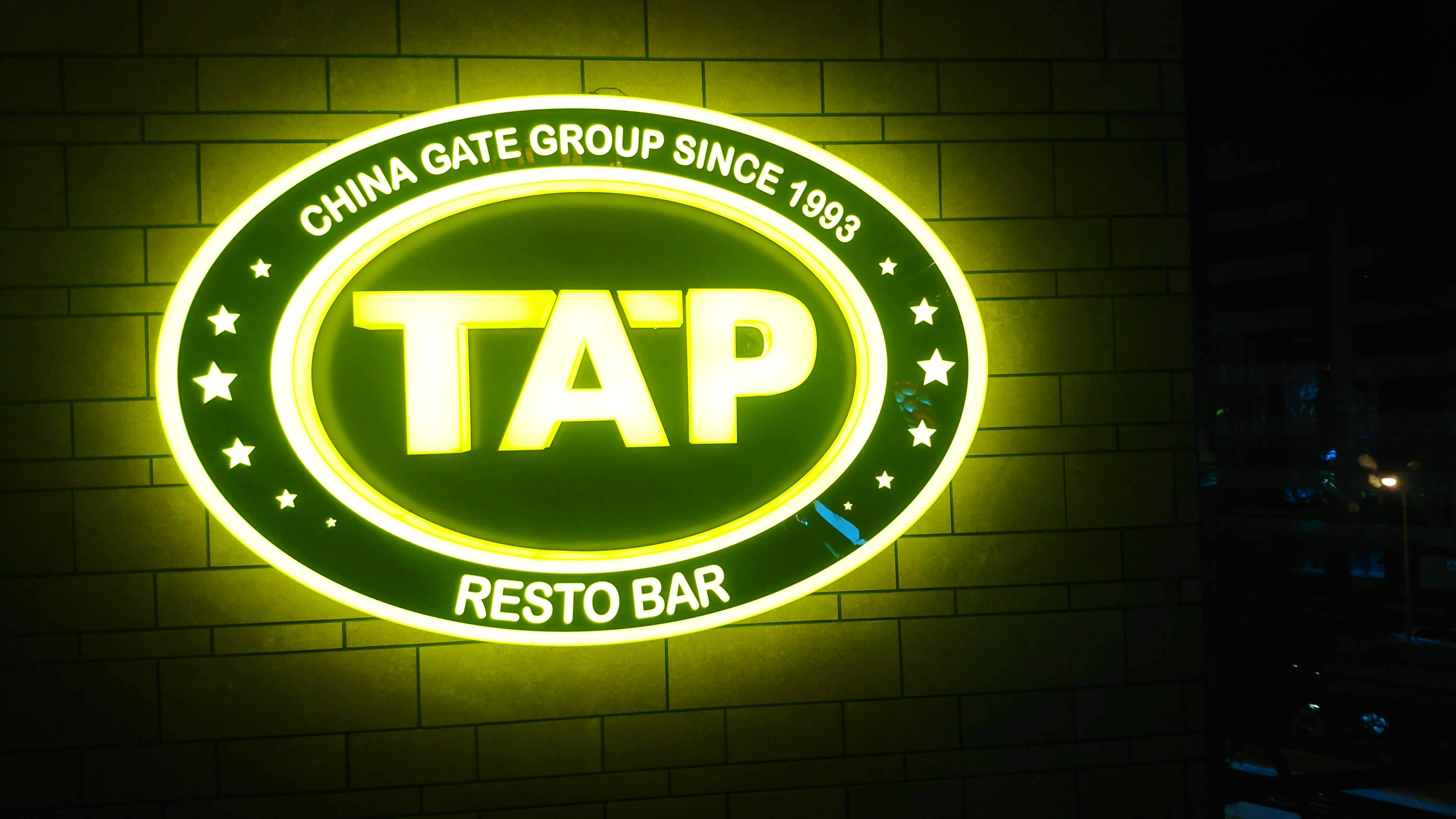 Green,Logo,Electronic signage,Signage,Font,Graphics,Neon sign,Emblem,Trademark,Brand