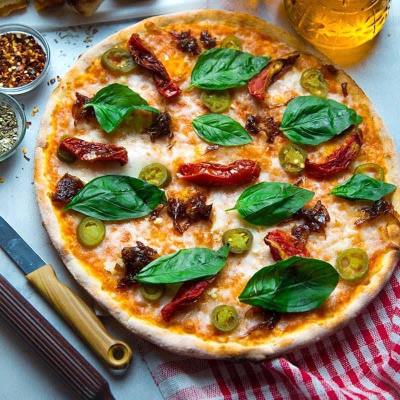 Dish,Pizza,Food,Cuisine,Pizza cheese,Ingredient,California-style pizza,Flatbread,Italian food,Basil