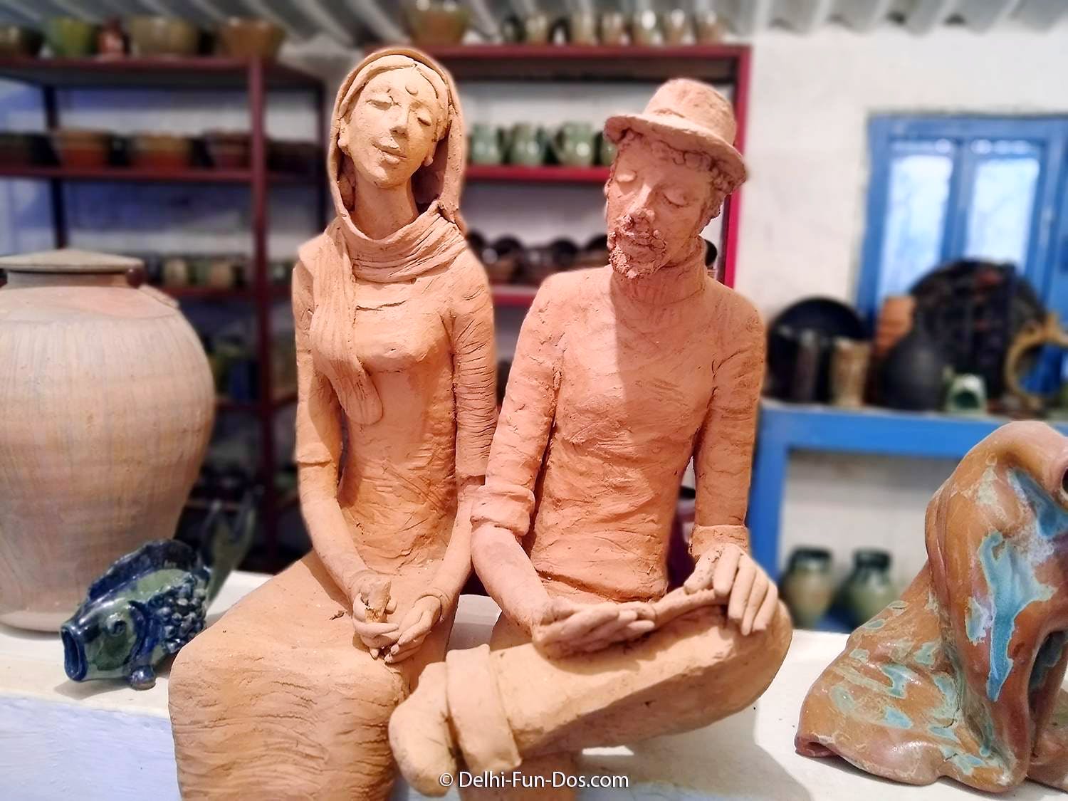 Sculpture,Figurine,Art,Carving,Sculptor,Nativity scene,Chainsaw carving,Statue,Classical sculpture,Ceramic