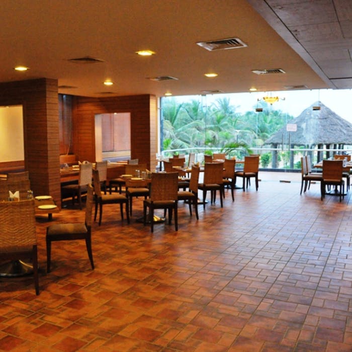 Floor,Restaurant,Building,Flooring,Room,Interior design,Lobby,Real estate,Table,Cafeteria