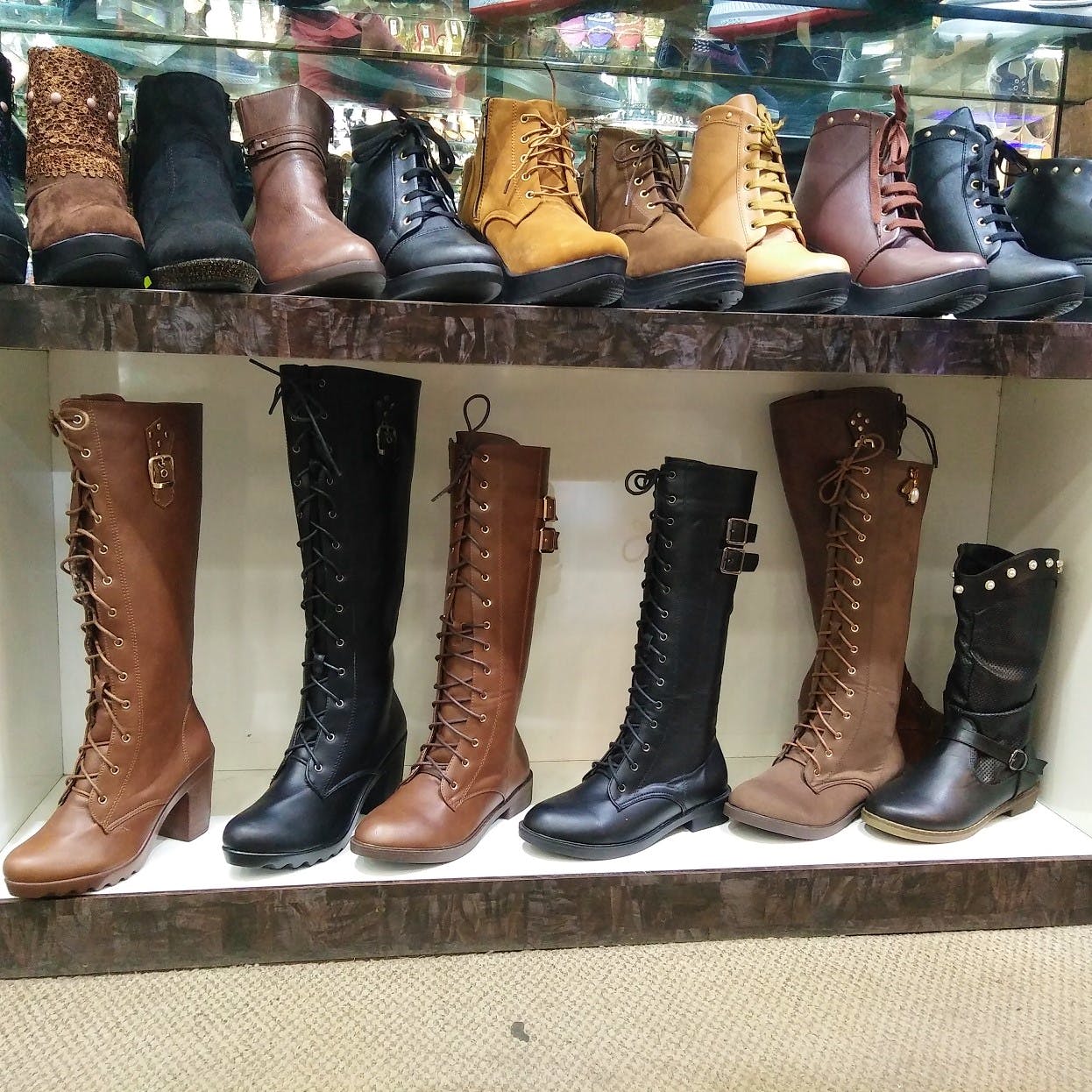 Footwear,Boot,Shoe,Brown,Riding boot,Fashion,Durango boot,Cowboy boot,Shoe store,Motorcycle boot