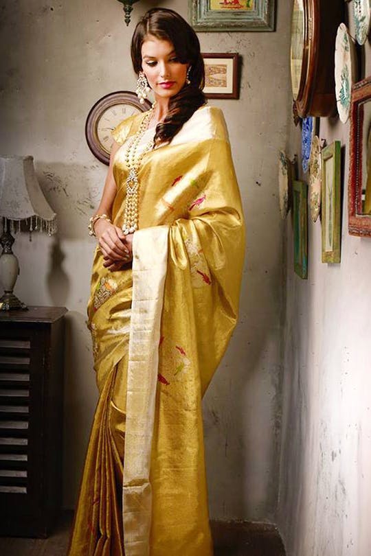 Clothing,Yellow,Sari,Silk,Fashion model,Textile,Formal wear,Fashion design