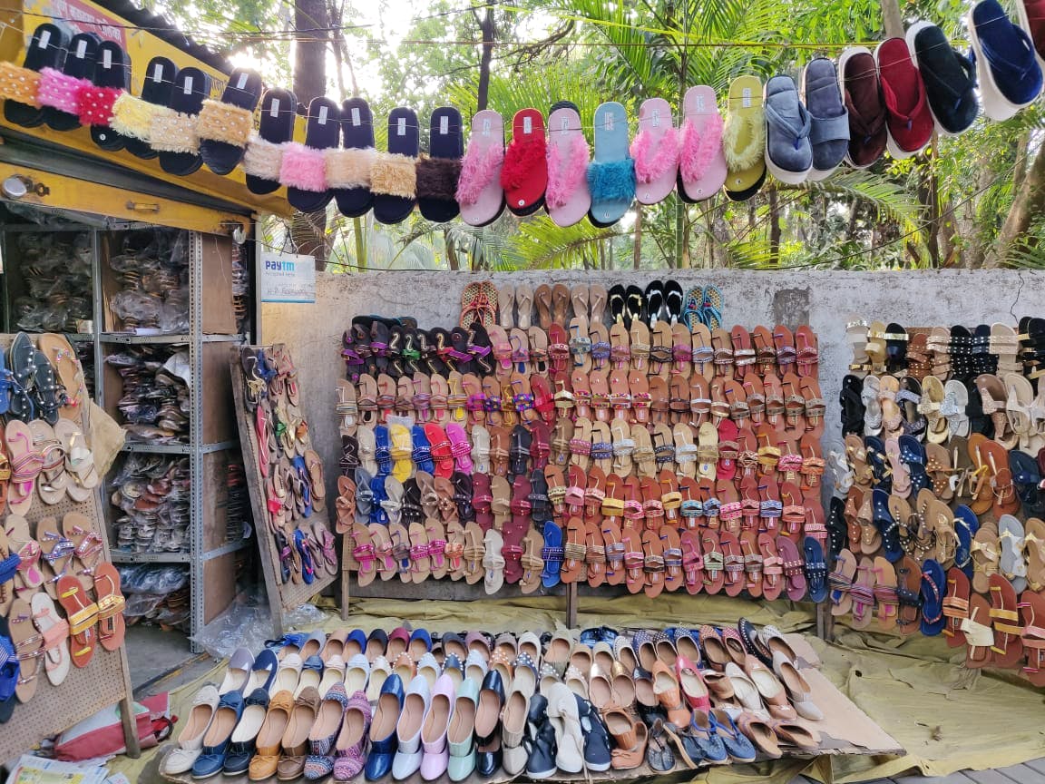 Selling,Marketplace,Public space,Bazaar,Footwear,Retail,Market,Textile,Building,Outlet store