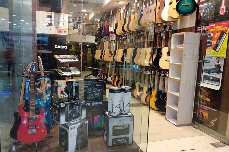 Product,Outlet store,Retail,Building,Guitar,Footwear,Inventory,Electronics,Shopping mall,Shoe