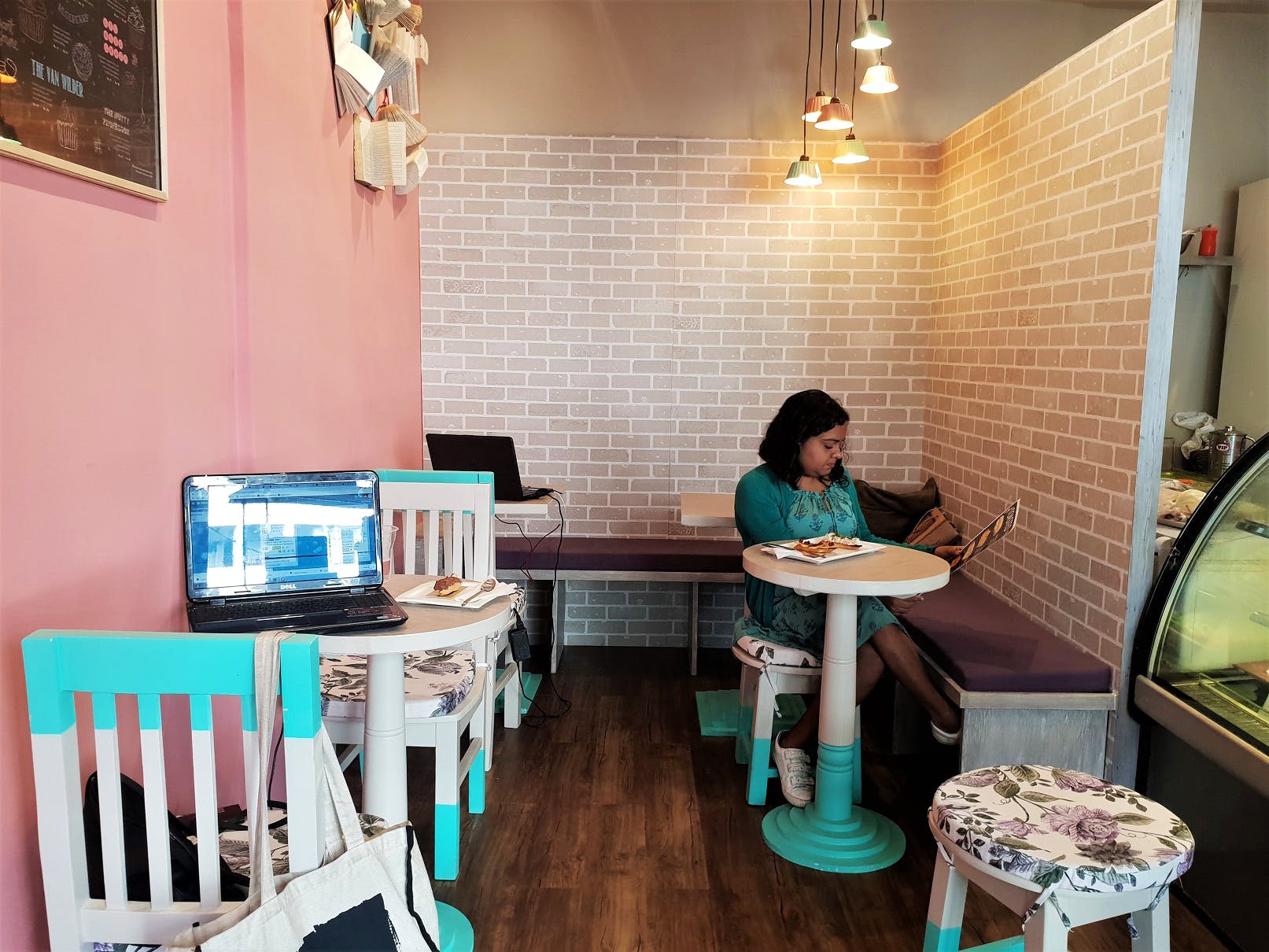 Turquoise,Room,Interior design,Table,House,Furniture,Building,Bar stool,Floor