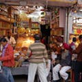 Bazaar,Market,Public space,Marketplace,Human settlement,Retail,City,Shopkeeper,Building,Selling