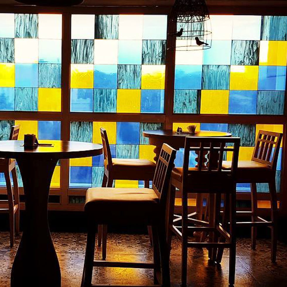 Blue,Room,Furniture,Yellow,Table,Interior design,Restaurant,Wall,Chair,Dining room
