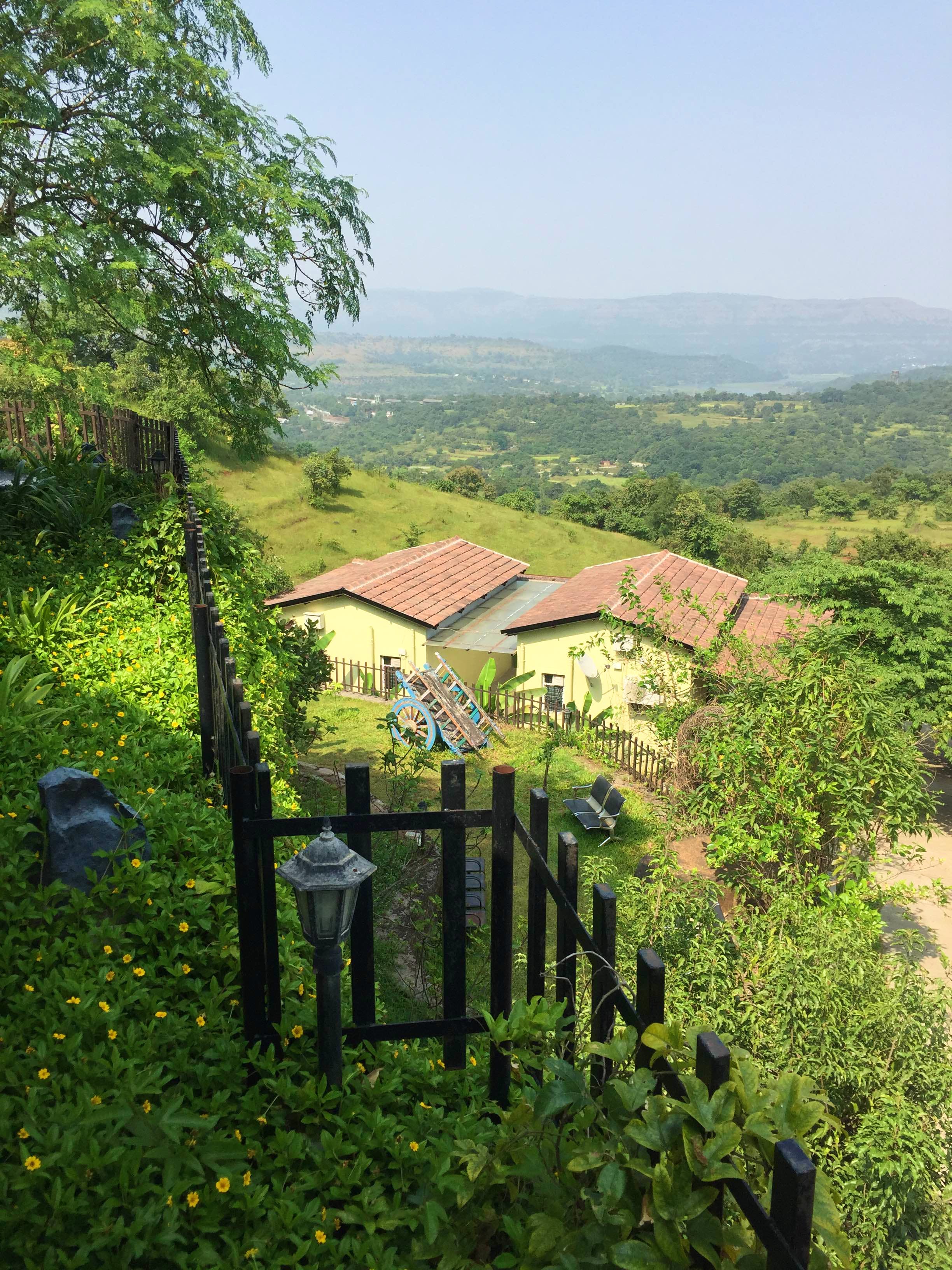 Vegetation,Atmospheric phenomenon,Green,Hill station,Tree,Rural area,Leaf,House,Hill,Grass