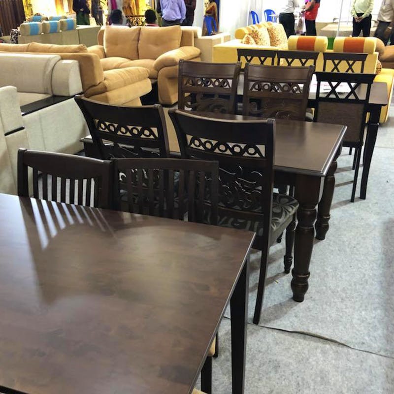 Table,Furniture,Chair,Kitchen & dining room table,Restaurant,Dining room,Floor,Room,Flooring,Interior design