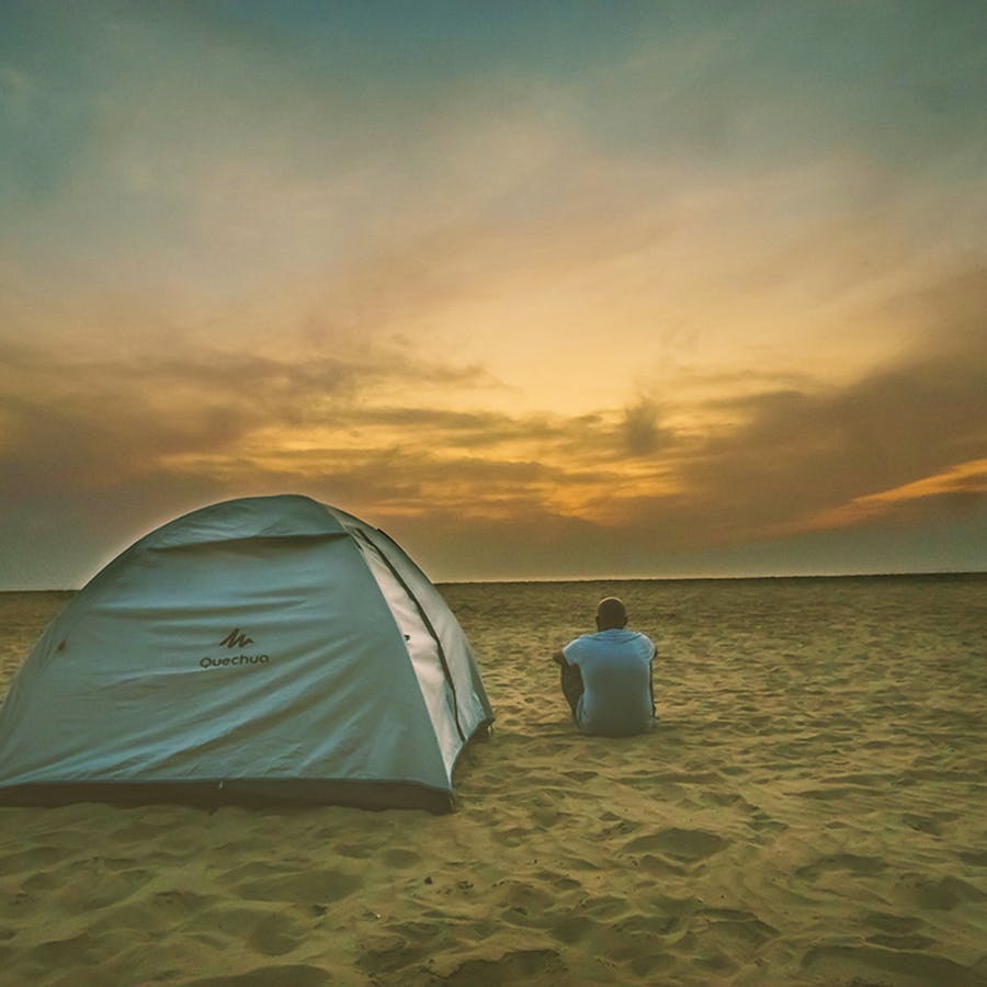 Sky,Tent,Morning,Natural environment,Horizon,Sea,Cloud,Ecoregion,Beach,Shore