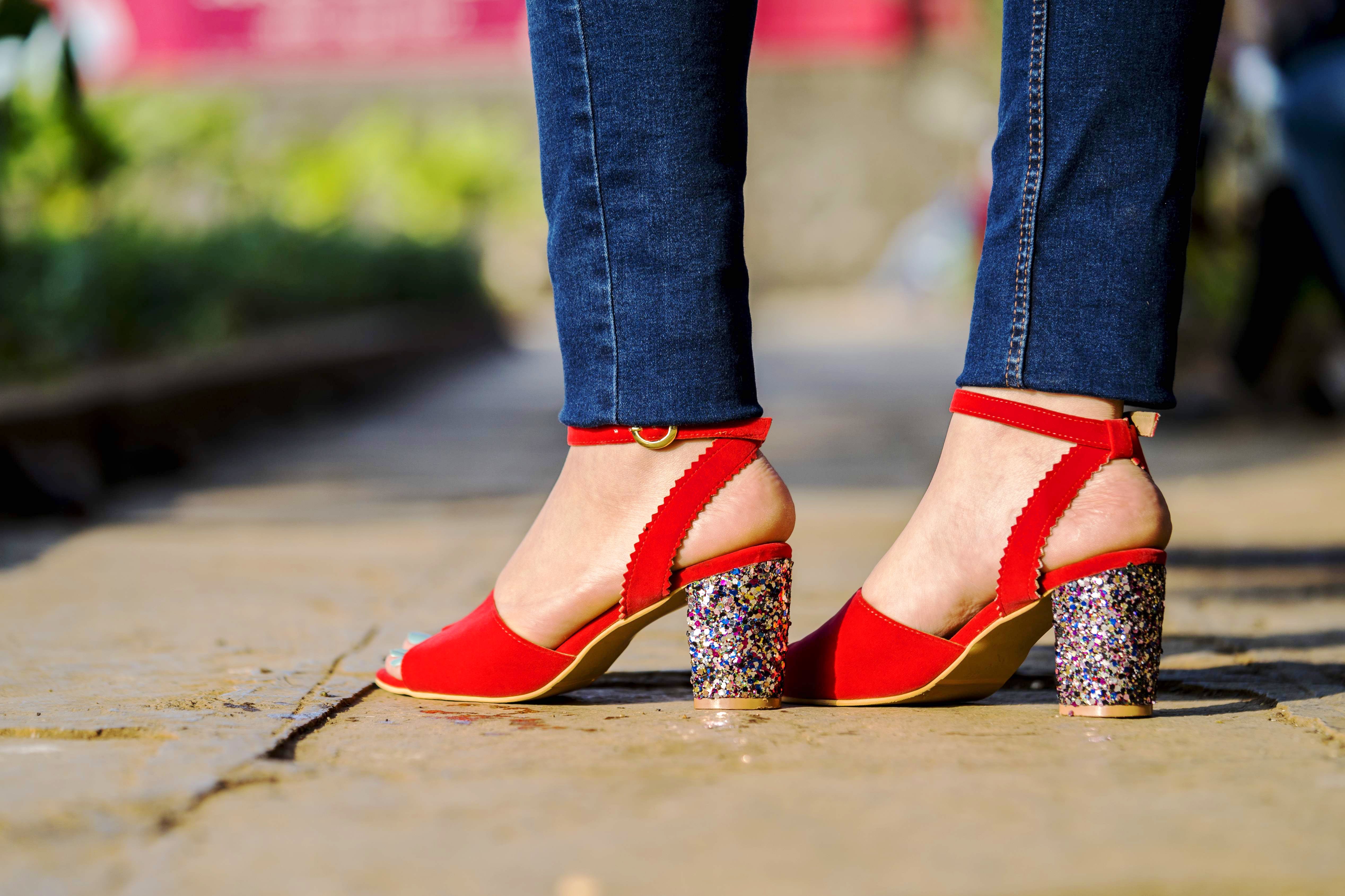 Footwear,Red,Shoe,High heels,Street fashion,Jeans,Leg,Human leg,Fashion,Yellow