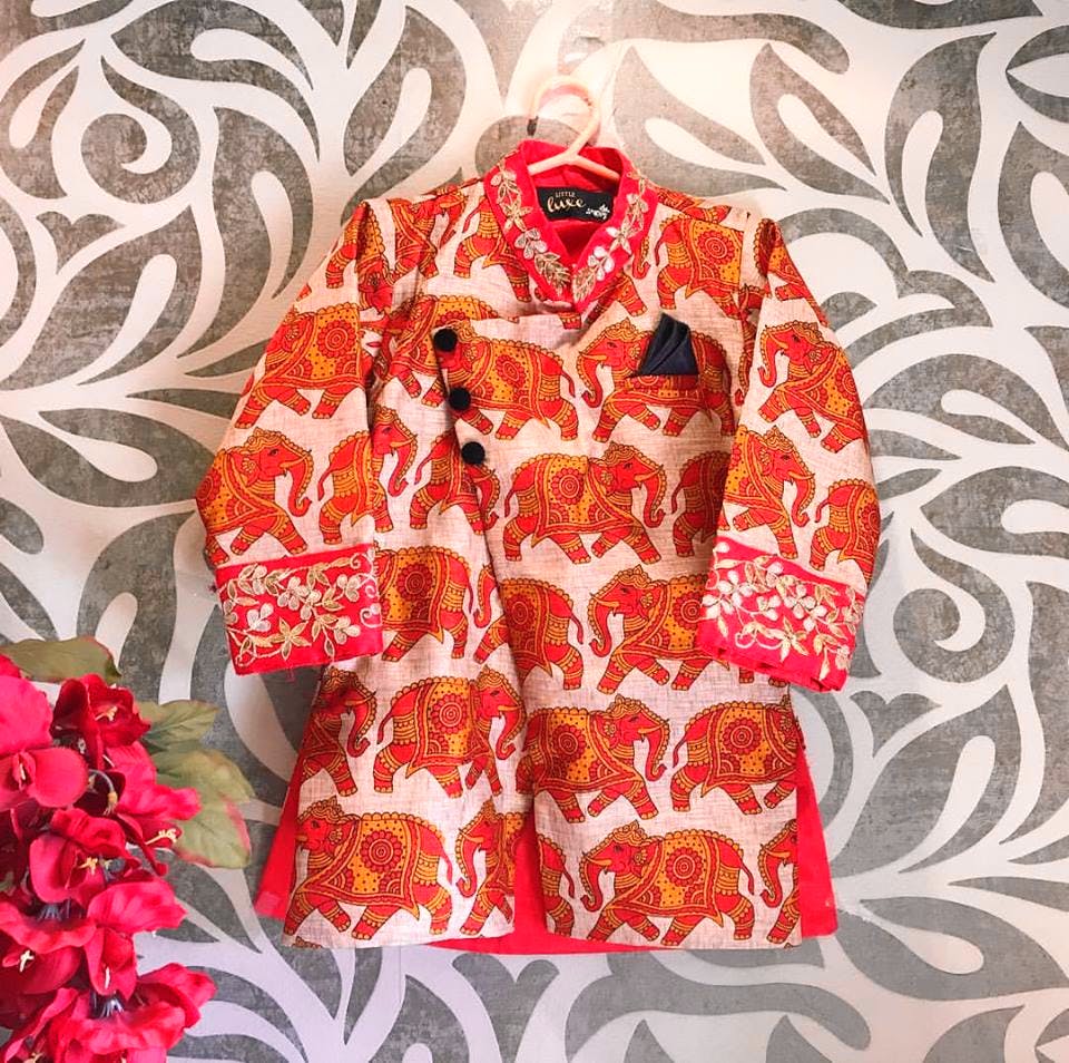Clothing,Red,Outerwear,Pattern,Sleeve,Pattern,Textile,Baby & toddler clothing,Plant